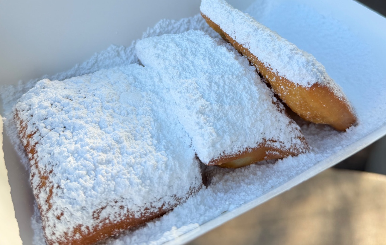 Powdered sugar beignets from the Golden Oak Outpost at Magic Kingdom