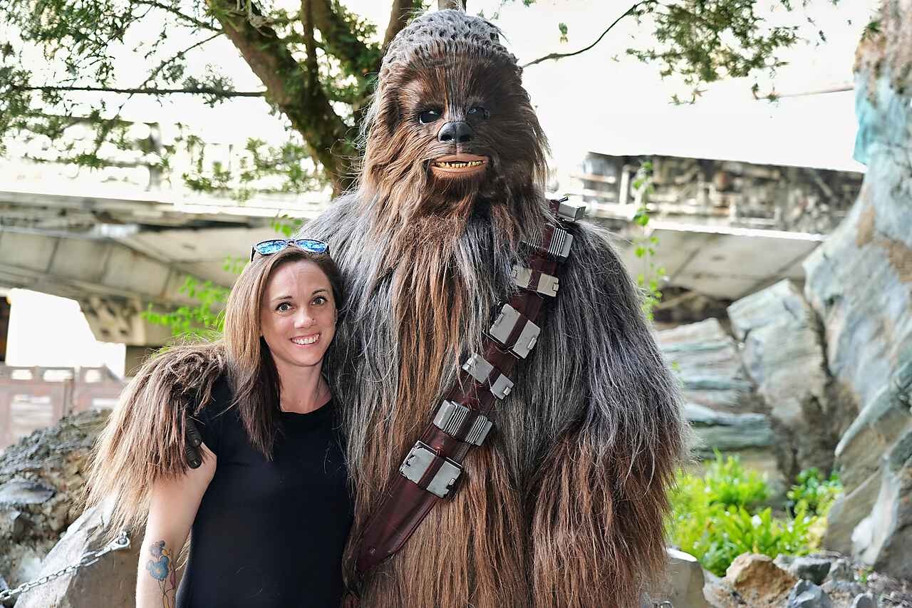 Jenn Lalonde with Chewbacca at Star Wars: Galaxy's Edge