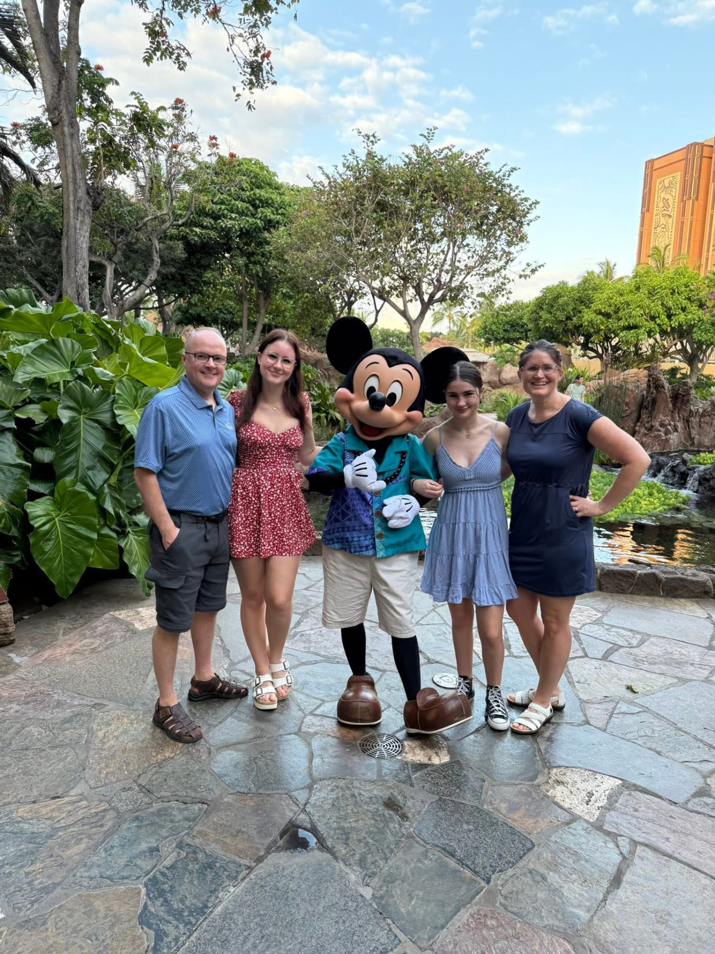 Amy Wear and family with Mickey at Aulani, Oahu