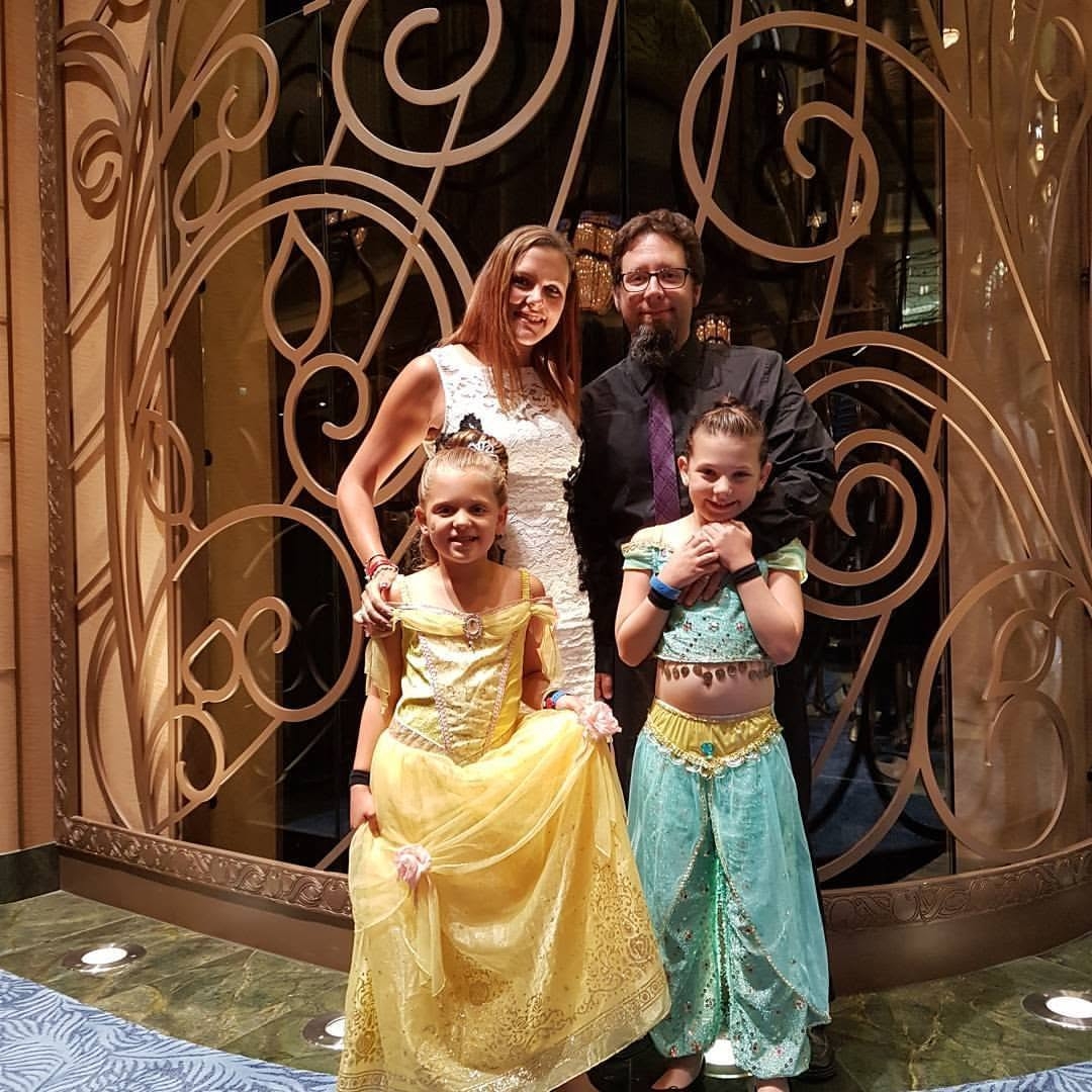 Jen's family dressed as Disney princesses on the Disney Fantasy