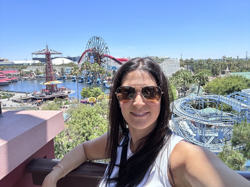 Deborah on the concierge terrace at Disney's Grand Californian Hotel overlooking California Adventure