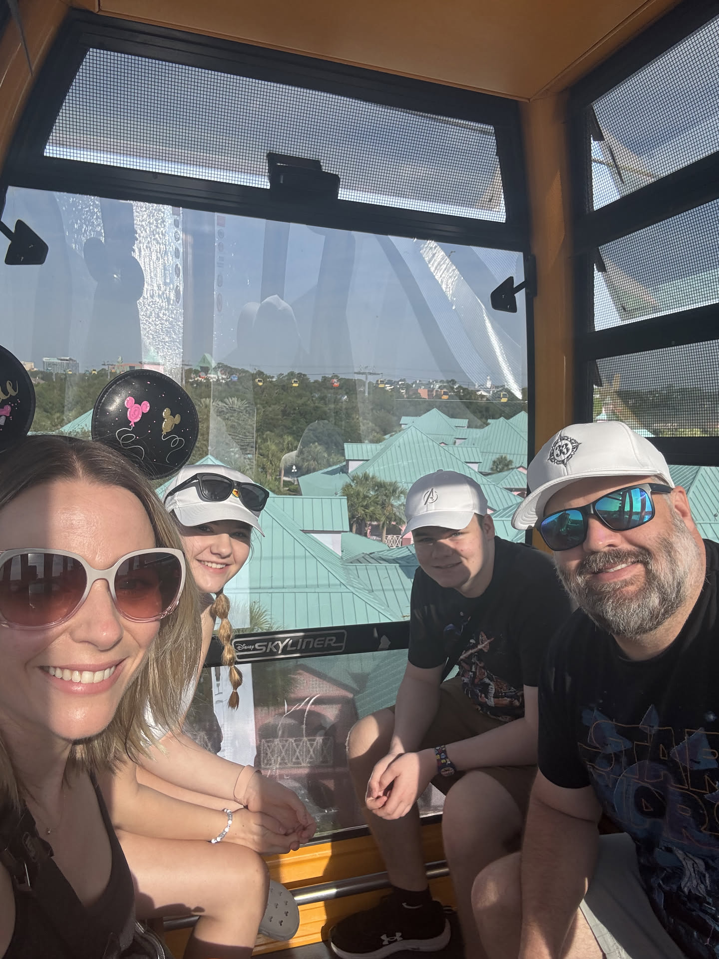 Michelle and her family riding the Disney Skyliner gondola