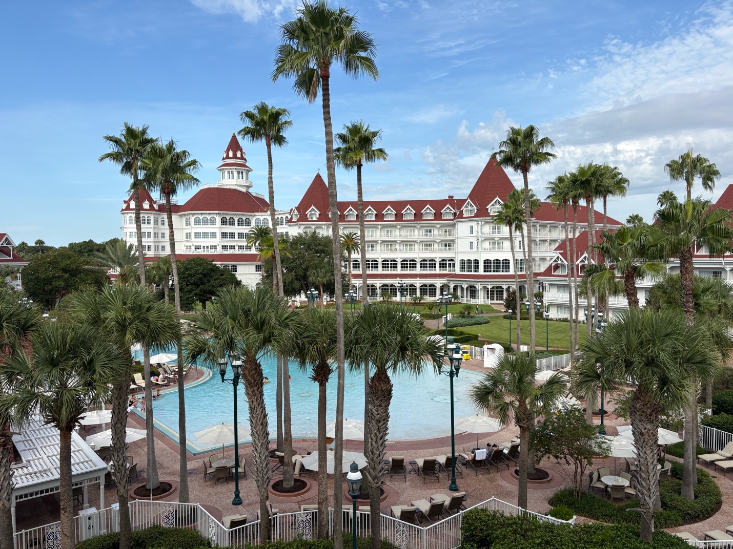 Disney's Grand Floridian Resort and Spa, with its pool and palm trees