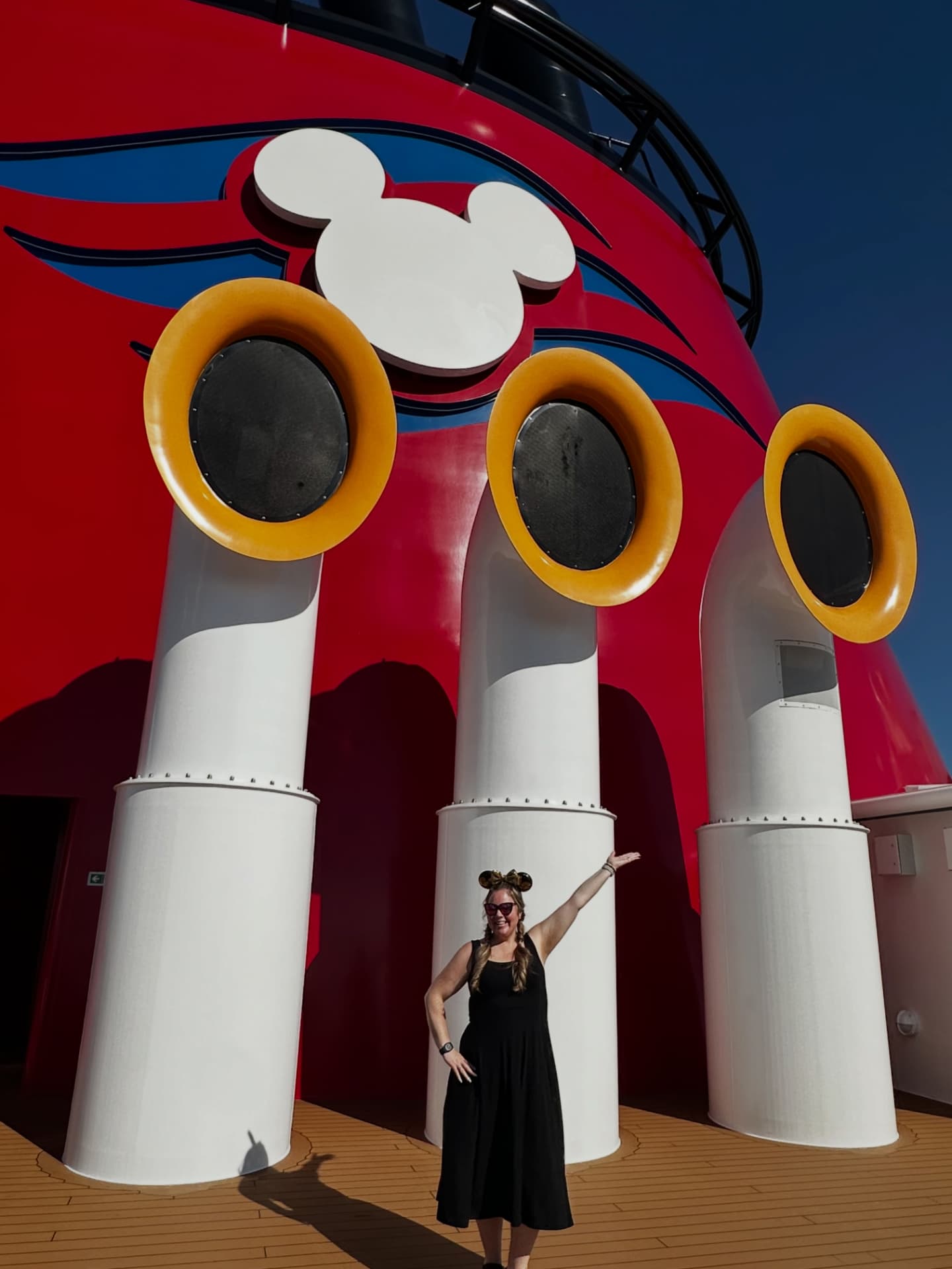 Sarah Field beside the Mickey funnel on a Disney Cruise Line ship deck