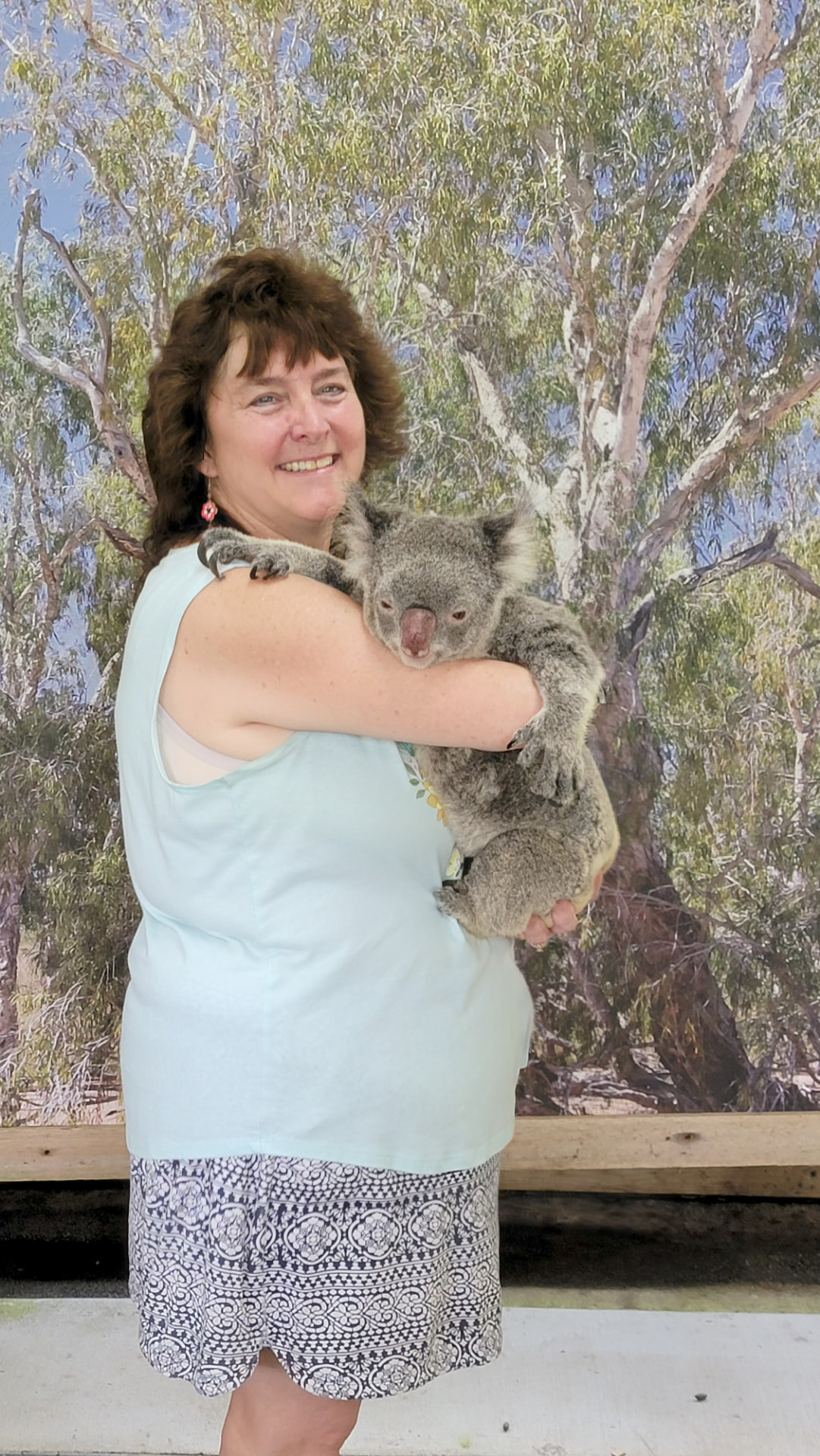 Faith Colletti holding a koala on an Adventures by Disney trip to Australia