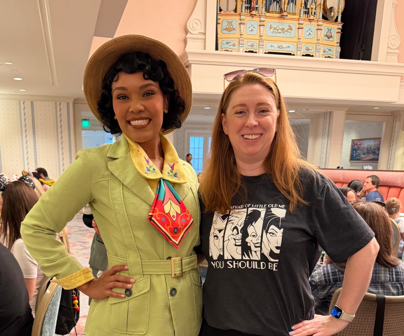 Laura Bodnik with a Disney character at the 1900 Park Fare character meal at Disney's Grand Floridian Resort