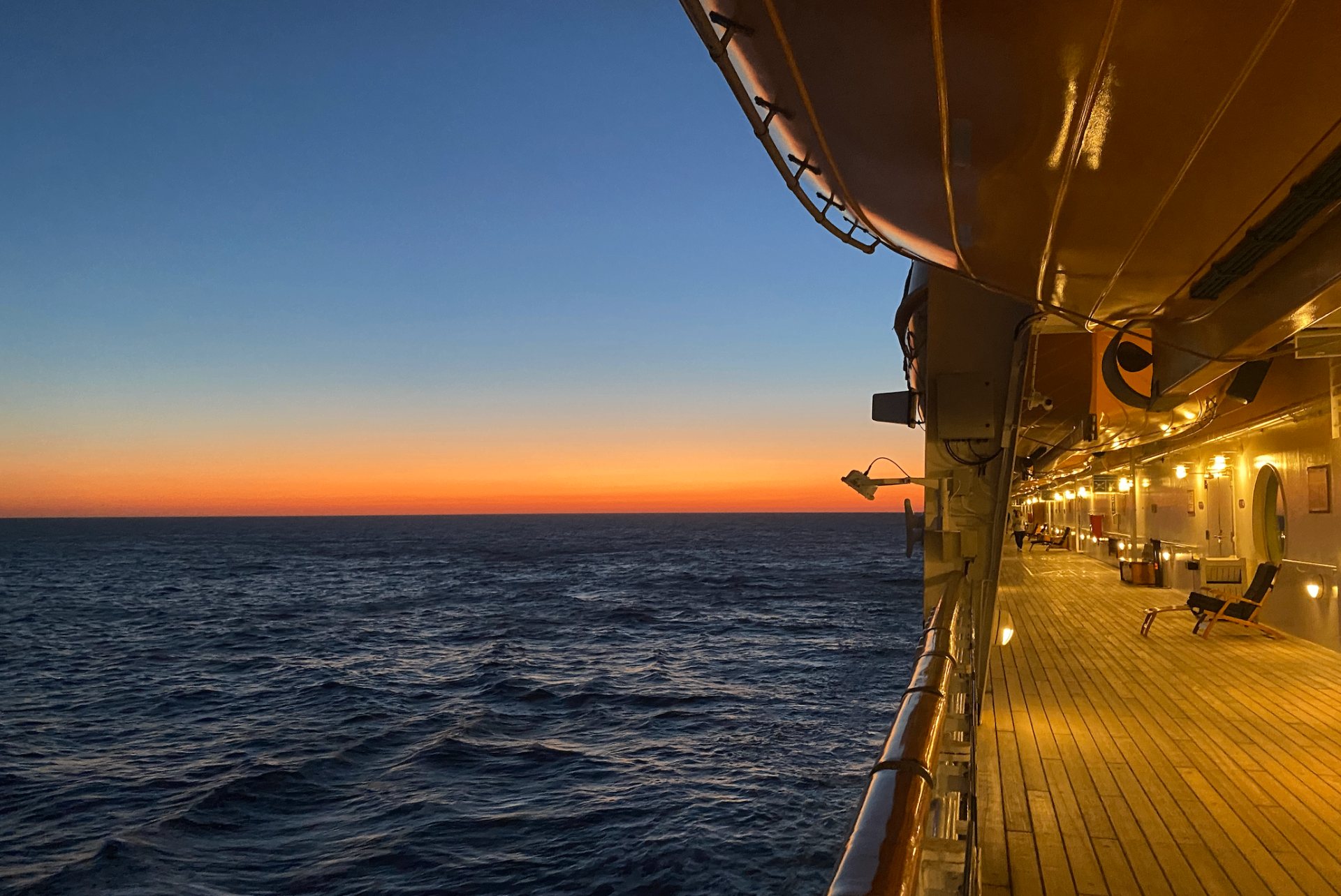 Sunset view from a cruise ship deck over the open ocean